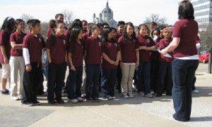 What does the growing K-12 enrollment in Minnesota charters and the decline in district enrollment mean?